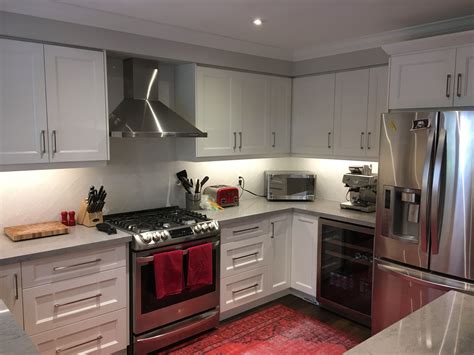 small 2 wall galley kitchen white cabinets stainless steel appliances|white galley kitchen designs.